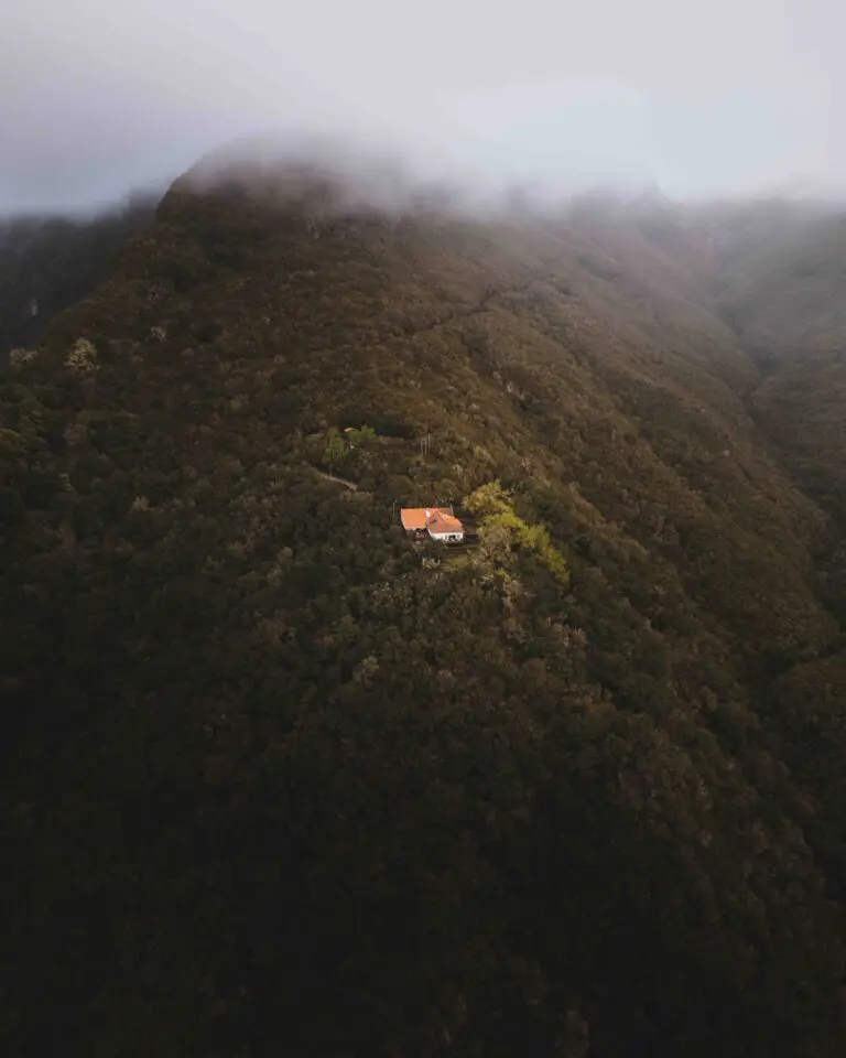 isolated house on a lush green mountain slope in Madeira